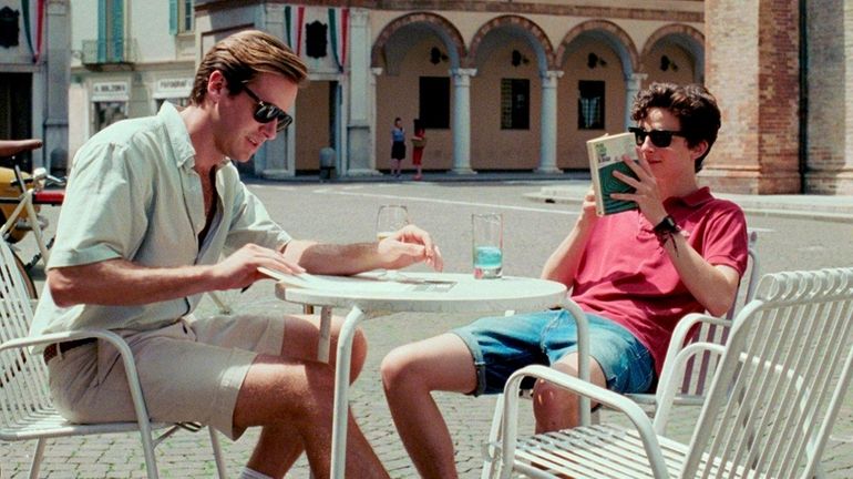 Armie Hammer, left, as Oliver and Timothée Chalamet as Elio...