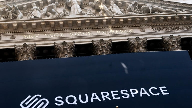 A banner for Squarespace hangs at the New York Stock...