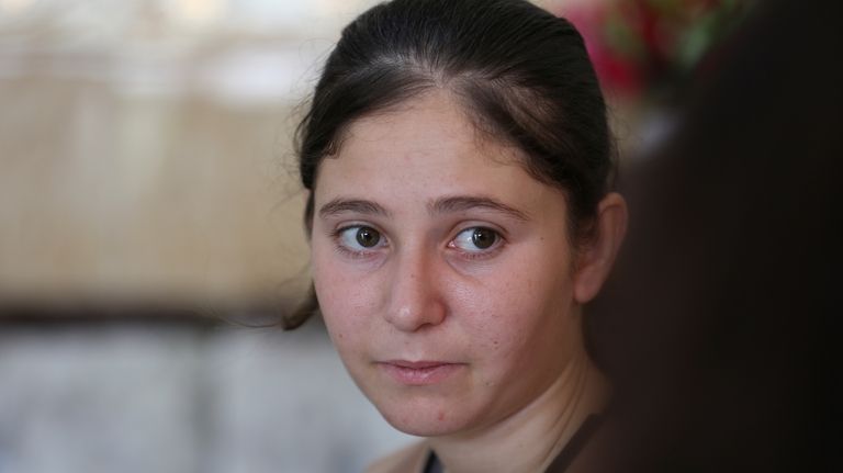 Rihan Ismail, 24, a Yazidi survivor who was kidnapped by...