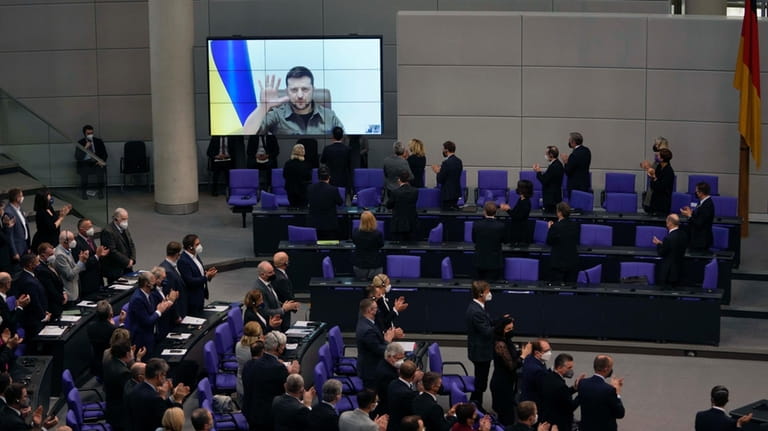 Members of the German parliament Bundestag give Ukraine President Volodymyr...