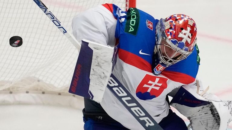 Slovakia's goalkeeper Samuel Hlavaj makes a save during the preliminary...