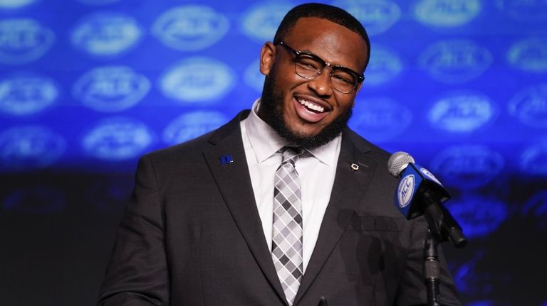 Duke defensive tackle DeWayne Carter speaks during the Atlantic Coast...