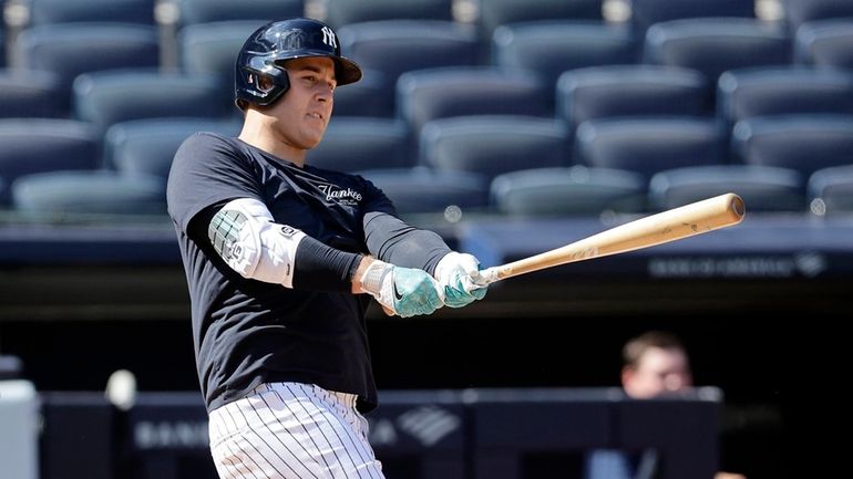 Anthony Rizzo of the Yankees takes live batting practice before a game...