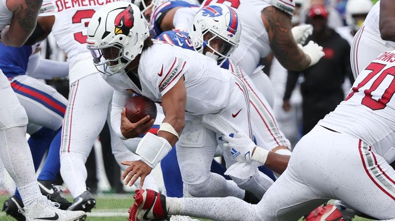 Arizona Cardinals quarterback Kyler Murray is sacked by Buffalo Bills...