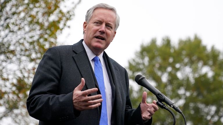 White House chief of staff Mark Meadows speaks with reporters...