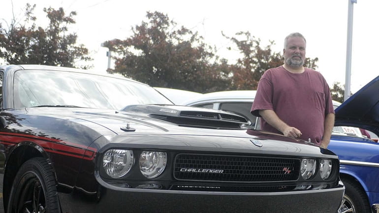 Joseph Testagrose of North Bellmore displays his 2010 Dodge Challenger...