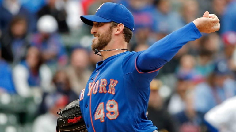 Jonathon Niese #49 of the New York Mets pitches against...