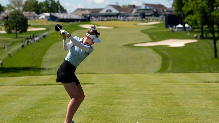 Nelly Korda hits her tee shot on the 18th hole...