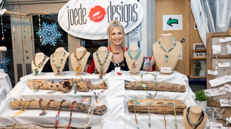 Jodi Prendergast sells her handcrafted jewelry at a craft fair...