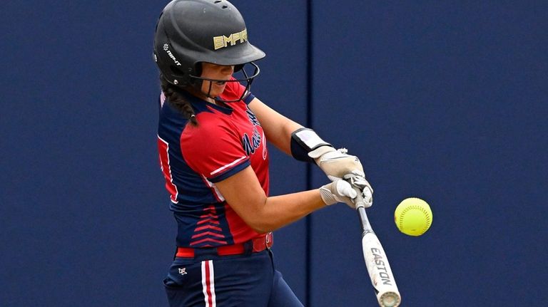 Massapequa International's Charlotte Welsh hits an RBI single during the...