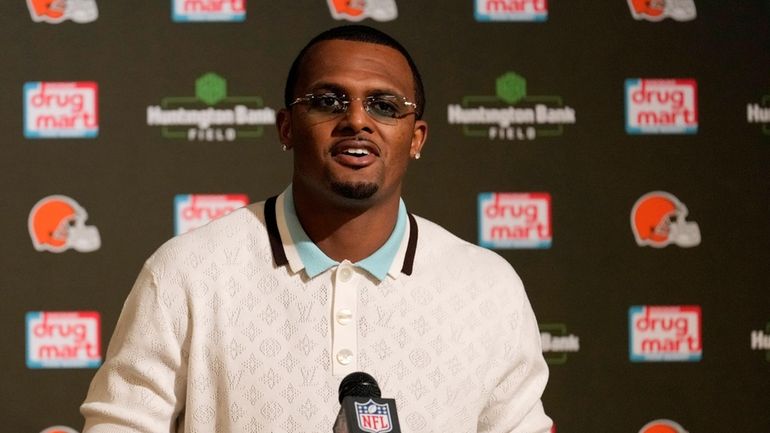 Cleveland Browns' Deshaun Watson responds to questions during a news...