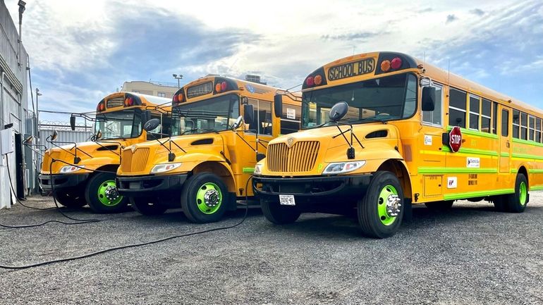 Electric school buses from Logan Bus Co. Inc. provide school bus transportation...