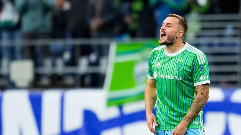 Seattle Sounders forward Jordan Morris reacts after scoring against the...