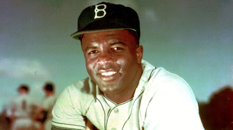 Brooklyn Dodgers baseball player Jackie Robinson poses in this 1952...