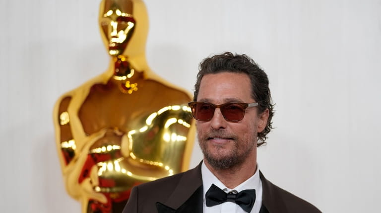 Matthew McConaughey arrives at the Oscars, March 10, 2024, at...