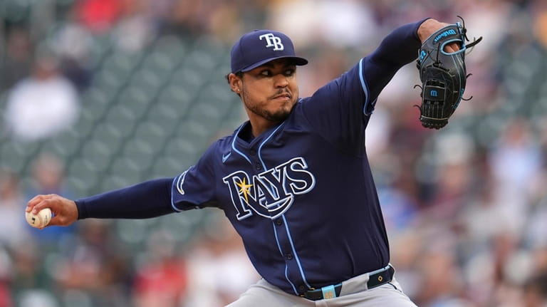 Tampa Bay Rays starting pitcher Taj Bradley delivers during the...