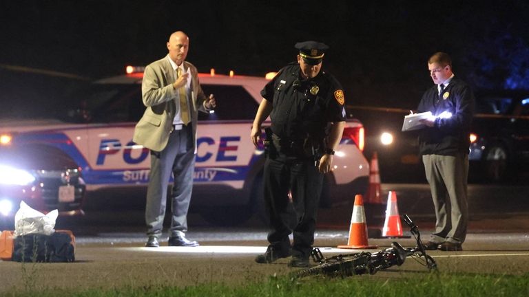 Suffolk County police at the scene where Anthony Stinson, 13, was...