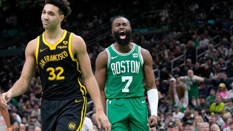 Boston Celtics guard Jaylen Brown (7) celebrates near Golden State...