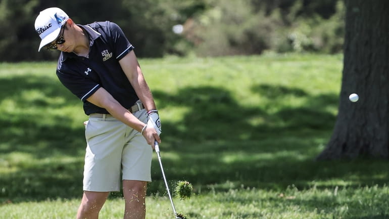 St. Anthony's Dean Muratore chips onto the green during the...