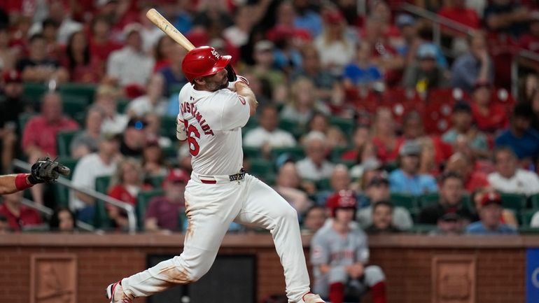 St. Louis Cardinals' Paul Goldschmidt follows through on an RBI...