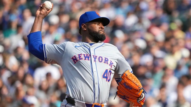 Mets pitcher Luis Severino throws during the second inning of...