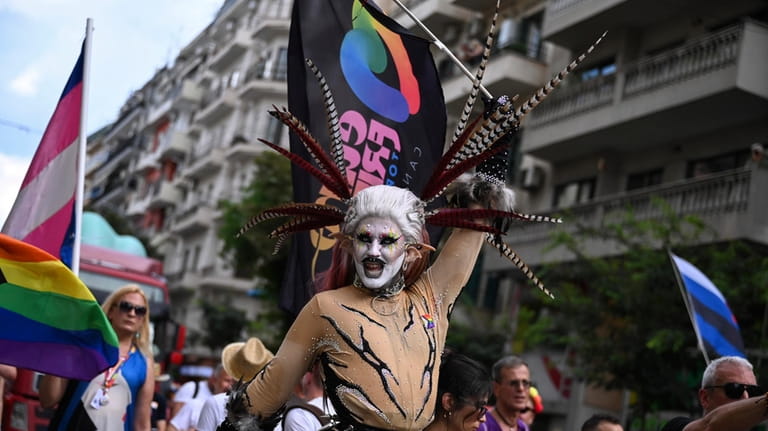 A reveller takes part in EuroPride, a pan-European international LGBTI...