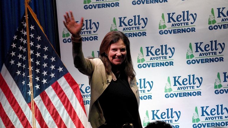 Republican gubernatorial candidate Kelly Ayotte celebrates at her victory party...