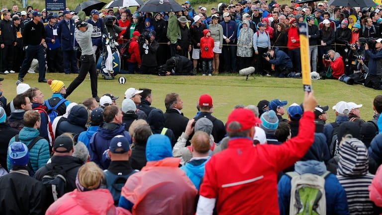 Henrik Stenson, of Sweden, plays his shot from the seventh...