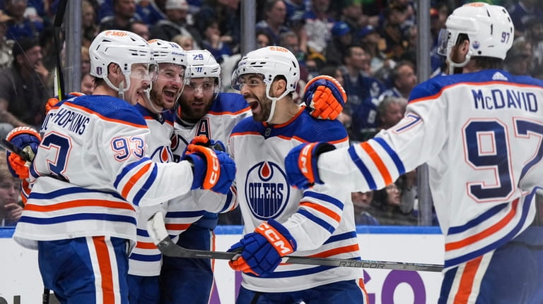 From left to right, Edmonton Oilers' Ryan Nugent-Hopkins, Zach Hyman,...