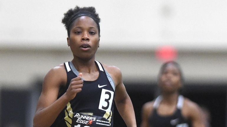 Gloria Guerrier of West Hempstead competes in the girls 600...