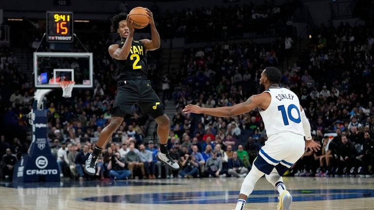 Utah Jazz guard Collin Sexton (2) jumps to grab a...