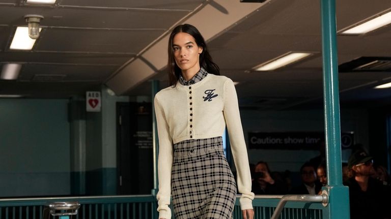 A model walks the runway during the Tommy Hilfiger Spring/Summer...