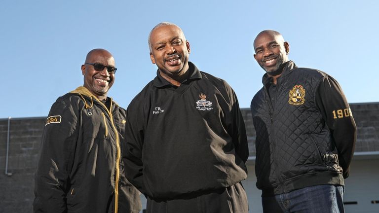 From left, Alpha Phi Alpha fraternity members Anthony Thompson of Wyandanch, chapter...