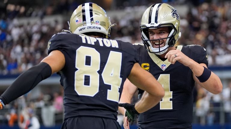 New Orleans Saints wide receiver Mason Tipton (84) and quarterback...