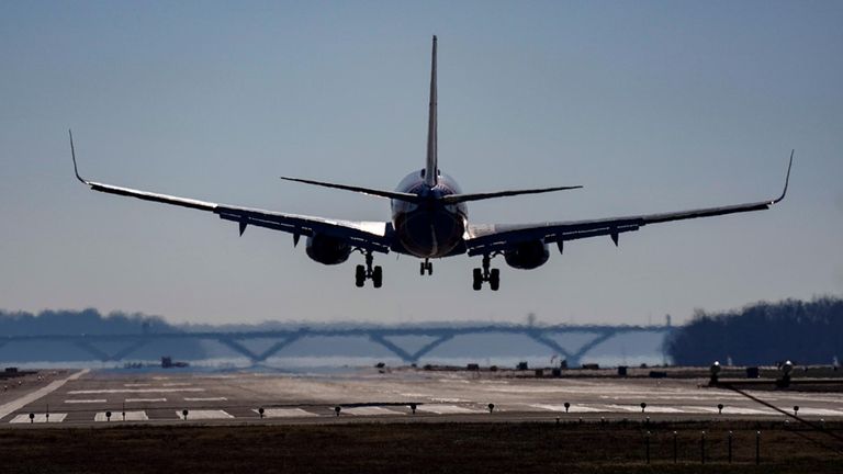 A Southwest plane lands at Ronald Reagan Washington National Airport...