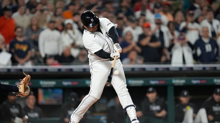 Detroit Tigers' Miguel Cabrera hits a double against the Cleveland...