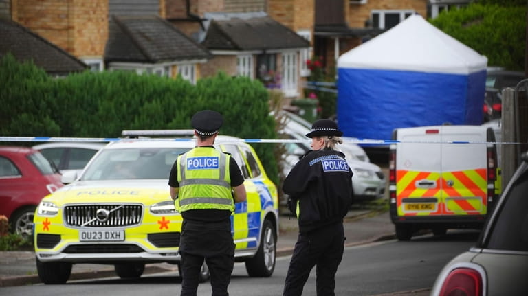 Police and emergency services at the scene in Ashlyn Close,...