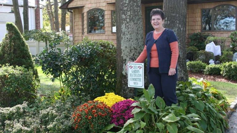 Homeowner Susan Otranto with her 2011 William Floyd Community Project...