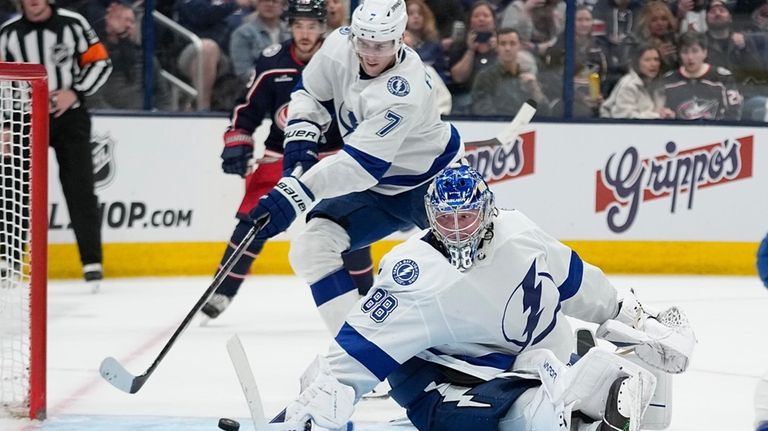 Tampa Bay Lightning defenseman Haydn Fleury (7) moves in to...