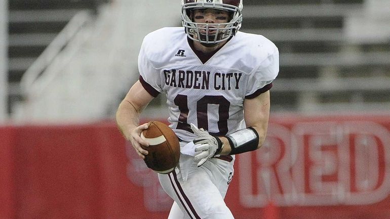 All-Long Island quarterback Brett Stewart leads the Trojans in defense...