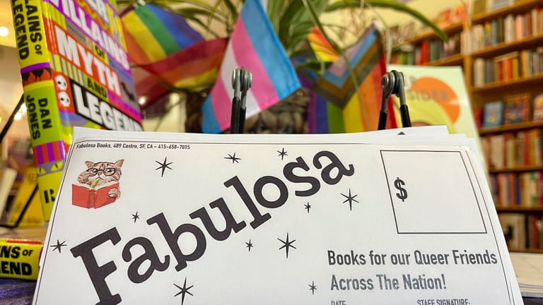 A donation slip is displayed at Fabulosa Books in the...