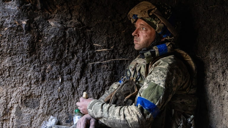 A Ukrainian serviceman from the 3rd Assault Brigade who goes...