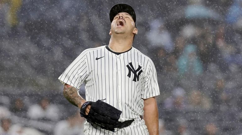 Nestor Cortes of the Yankees reacts after giving up a fifth-inning...