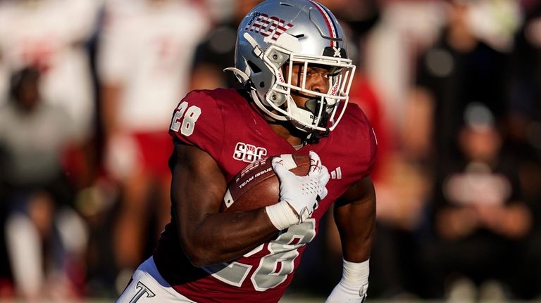 Troy running back Kimani Vidal (28) runs against the Louisiana-Lafayette...