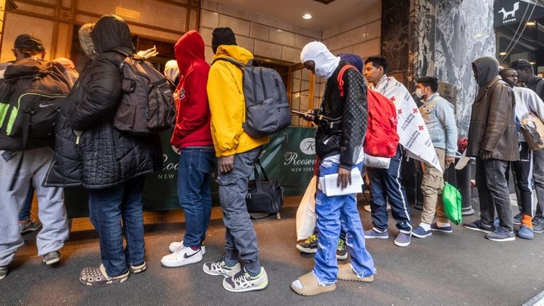 Migrants arriving at Roosevelt Hotel in New York City on...