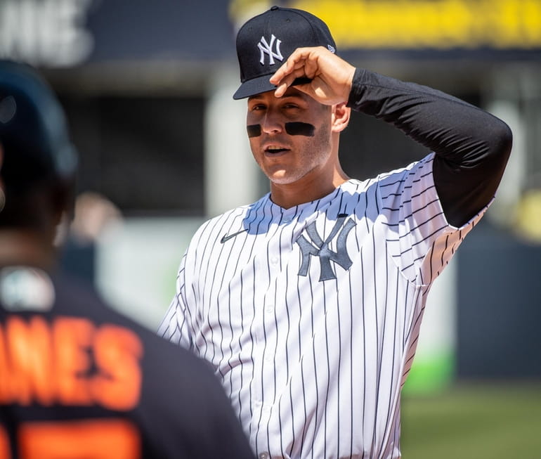 New York Yankees infielder Isiah Kiner-Falefa, right, is greeted by manager  Aaron Boone during a spring training baseball workout, Monday, March 14,  2022, in Tampa, Fla. (AP Photo/John Raoux Stock Photo 