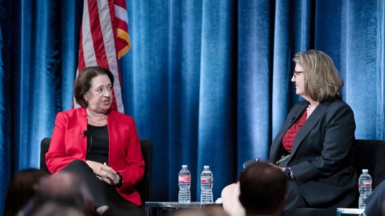 U.S. Supreme Court Justice Elena Kagan, left, talks with Madeleine...