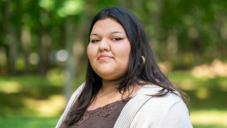 Luna Paucar, 19, outside her Bridgehampton home on Monday. She reached...