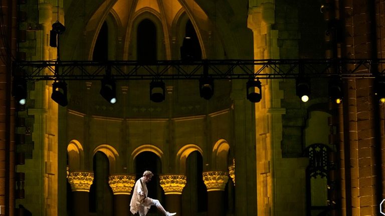 Philippe Petit walks a tightrope inside the Cathedral Church of...