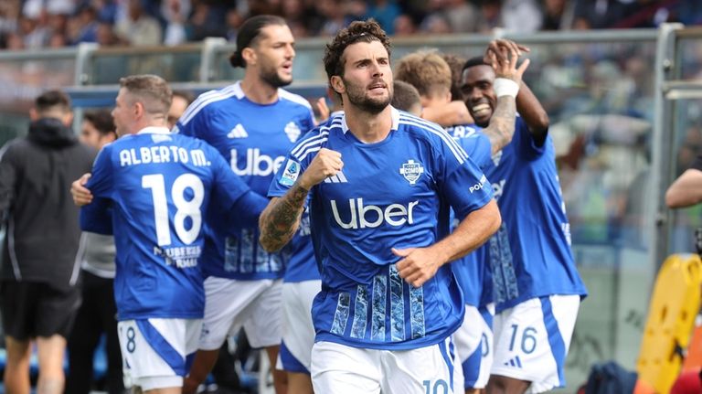 Como 1907's Patrick Cutrone celebrates scoring during the Serie A...